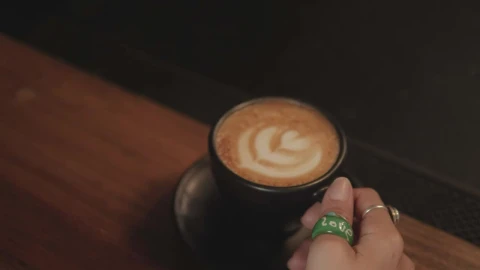 Free Stock Video Woman Drinking From A Cup Of Frothy Coffee Live Wallpaper - Free Live Wallpaper