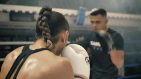 Free Stock Video Woman Doing Kickbox Movements With A Coach Live Wallpaper - Free Live Wallpaper