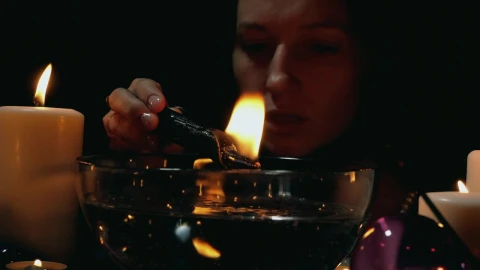 Free Stock Video Woman Doing A Ritual With A Candle Live Wallpaper - Free Live Wallpaper