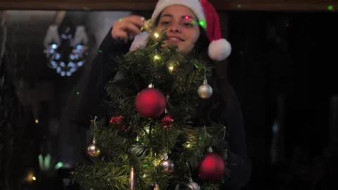 Free Stock Video Woman Decorating A Small Christmas Tree Live Wallpaper - Free Live Wallpaper