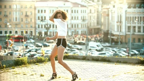 Free Stock Video Woman Dancing On The Roof Of A Building Live Wallpaper - Free Live Wallpaper