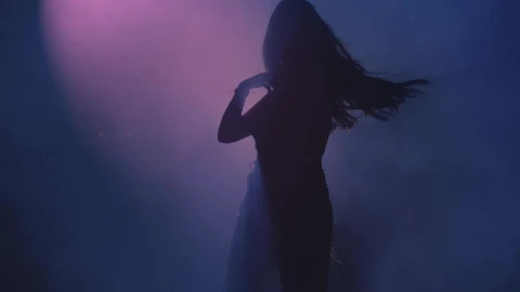 Free Stock Video Woman Dancing Energetically In The Dark Live Wallpaper - Free Live Wallpaper