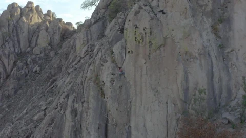Free Stock Video Woman Climbing A Gigantic Rocky Mountain Live Wallpaper - Free Live Wallpaper