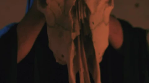 Free Stock Video Woman Bringing Her Hand To The Skull In A Ritual Live Wallpaper - Free Live Wallpaper