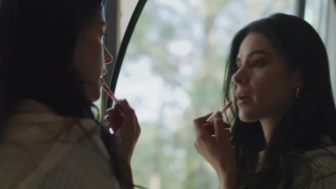 Free Stock Video Woman Applying Makeup In Front Of A Mirror Live Wallpaper - Free Live Wallpaper