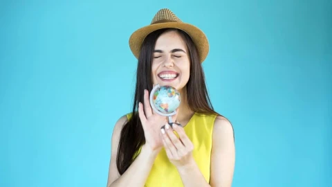 Stock Footage Woman Chooses A Country To Travel On A Globe Live Wallpaper - Free Live Wallpaper
