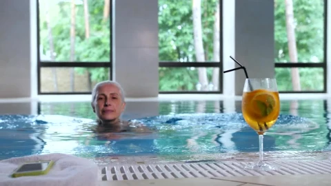 Stock Footage Woman Checking Her Phone In The Pool Live Wallpaper - Free Live Wallpaper