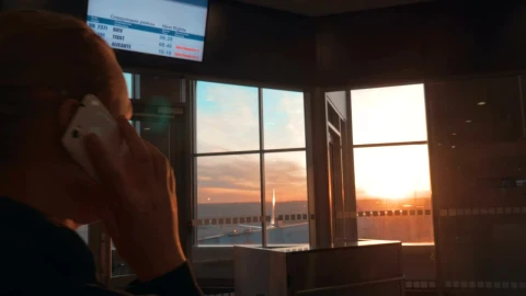 Stock Footage Woman Chatting While Waiting For A Flight To Leave Live Wallpaper - Free Live Wallpaper