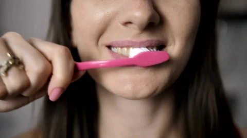 Stock Footage Woman Brushing Her Teeth In The Morning Live Wallpaper - Free Live Wallpaper