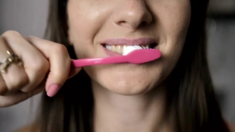 Stock Footage Woman Brushing Her Teeth Live Wallpaper - Free Live Wallpaper