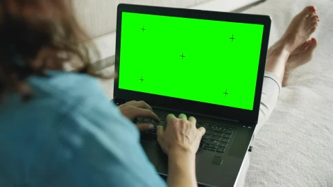 Stock Footage Woman Browsing Website On Laptop Greenscreen In Bed Live Wallpaper - Free Live Wallpaper