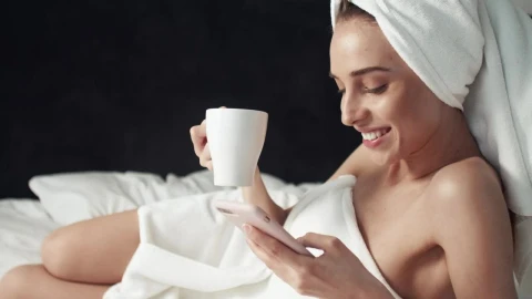 Stock Footage Woman Browsing Social Media After Shower Live Wallpaper - Free Live Wallpaper
