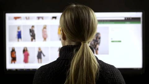 Stock Footage Woman Browsing A Fashion Website Back View Live Wallpaper - Free Live Wallpaper