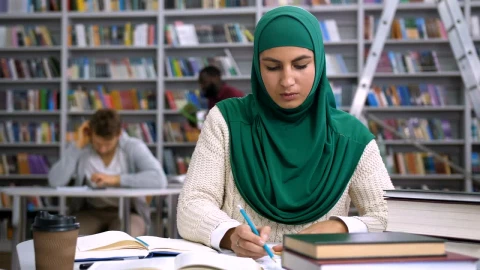 Stock Footage Woman At The Library Live Wallpaper - Free Live Wallpaper