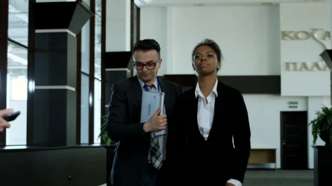 Stock Footage Woman Avoiding Journalists In The Hallway Live Wallpaper - Free Live Wallpaper