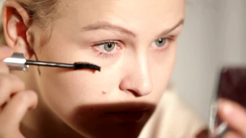 Stock Footage Woman Applying Makeup To Her Eyes Live Wallpaper - Free Live Wallpaper