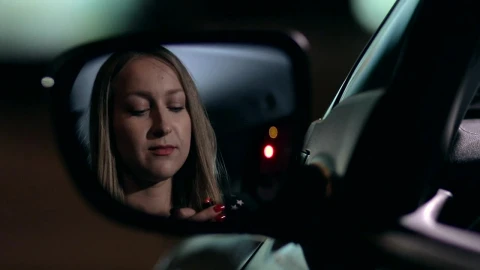 Stock Footage Woman Applying Lipstick In A Car Live Wallpaper - Free Live Wallpaper