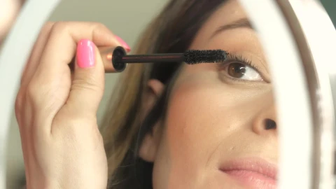 Stock Footage Woman Applies Mascara Live Wallpaper - Free Live Wallpaper