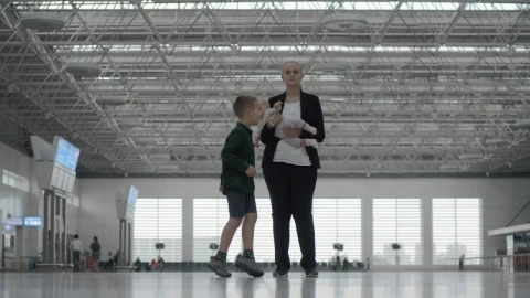 Stock Footage Woman And Her Kids At The Airport Live Wallpaper - Free Live Wallpaper