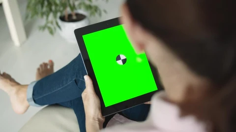Stock Footage Woman Admires Website On Chromakey Tablet Live Wallpaper - Free Live Wallpaper
