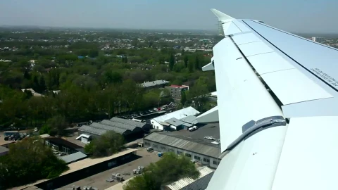 Stock Footage Window View Of An Airplane Landing In The Airport Live Wallpaper - Free Live Wallpaper