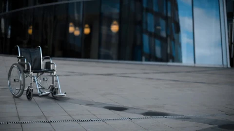 Stock Footage Wheelchair Walking Alone On The Sidewalk Live Wallpaper - Free Live Wallpaper