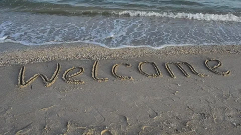Stock Footage Welcome In The Sand At The Seashore Live Wallpaper - Free Live Wallpaper