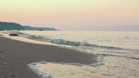 Stock Footage Waves Washing Up Against A Clean Beach Live Wallpaper - Free Live Wallpaper