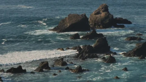 Stock Footage Waves Hitting Rocks On The Beach Live Wallpaper - Free Live Wallpaper