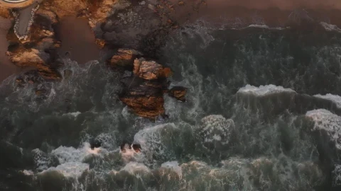 Stock Footage Waves Crash On A Shore With Boulders Live Wallpaper - Free Live Wallpaper