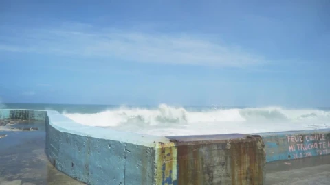 Stock Footage Waves Breaking Against A Coastal Wall Live Wallpaper - Free Live Wallpaper