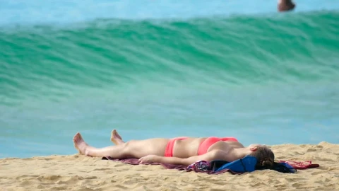 Stock Footage Wave Crashing In The Beach With A Girl In Bikini Live Wallpaper - Free Live Wallpaper