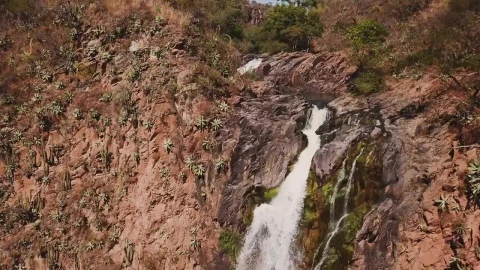 Stock Footage Waterfall Over Red Rocks Creating A Rainbow Live Wallpaper - Free Live Wallpaper