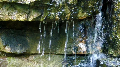 Stock Footage Water Running Off Rocks Live Wallpaper - Free Live Wallpaper