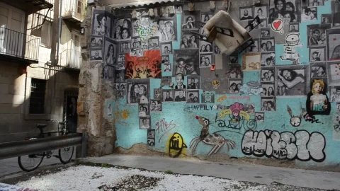 Stock Footage Wall With Portraits And Graffiti Live Wallpaper - Free Live Wallpaper