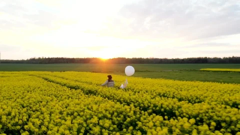 Stock Footage Walking On A Flower Field With A White Balloon At Live Wallpaper - Free Live Wallpaper