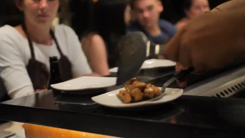 Stock Footage Waiter Serving Meat Stew In A Restaurant Live Wallpaper - Free Live Wallpaper