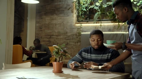 Stock Footage Waiter Bringing The Tea To The Customer Live Wallpaper - Free Live Wallpaper
