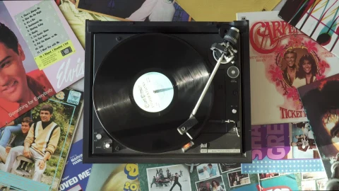 Stock Footage Vintage Turntable Surrounded By Many Albums Live Wallpaper - Free Live Wallpaper