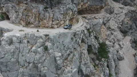 Stock Footage Vehicle Driving Through The Rocky Mountain Road Live Wallpaper - Free Live Wallpaper