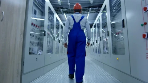 Stock Footage Worker Walking In Industrial Machine Corridor Live Wallpaper Free - Free Live Wallpaper