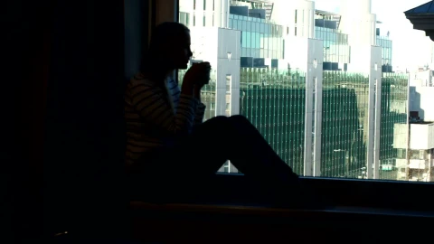 Stock Footage Woman Drinking Coffee In A Dark Room Live Wallpaper Free - Free Live Wallpaper