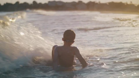 Stock Footage Young Boy Playing In The Waves Live Wallpaper Free - Free Live Wallpaper