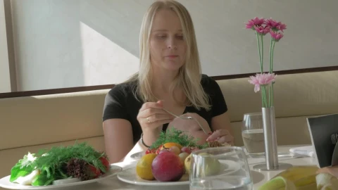 Stock Footage Woman Eating Lunch With Her Baby Live Wallpaper Free - Free Live Wallpaper