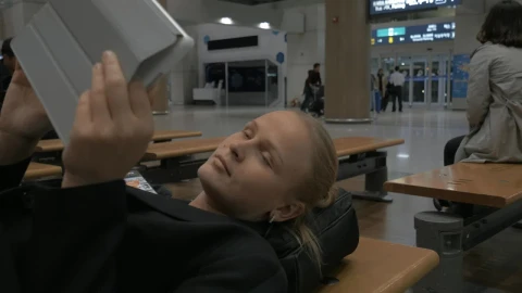 Stock Footage Woman Waiting During A Flight Delay Live Wallpaper Free - Free Live Wallpaper