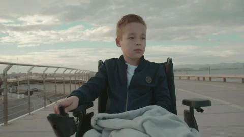 Stock Footage Young Boy In An Electric Wheelchair Live Wallpaper Free - Free Live Wallpaper