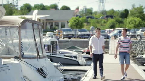 Stock Footage Yacht Salesman With A Young Customer Live Wallpaper Free - Free Live Wallpaper
