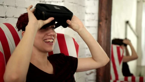 Stock Footage Woman Lowering A Vr Headset Live Wallpaper Free - Free Live Wallpaper