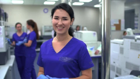 Stock Footage Woman In A Laboratory Doing Thumb Up Live Wallpaper Free - Free Live Wallpaper