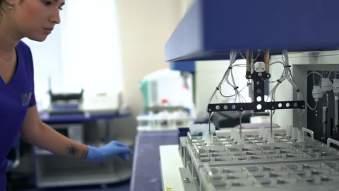 Stock Footage Woman Working With Samples In Laboratory Live Wallpaper Free - Free Live Wallpaper